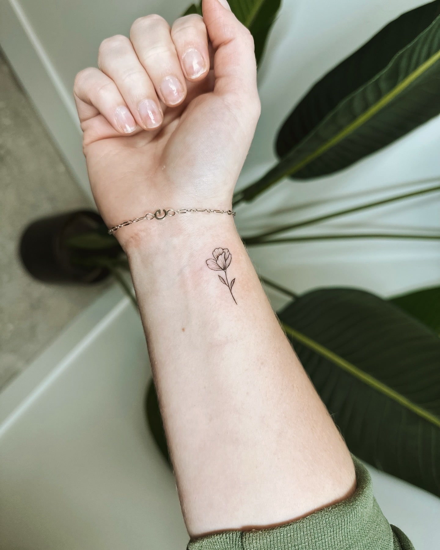 Delicate Floral Wrist Tattoo Simple and Elegant Flower Design for Women
