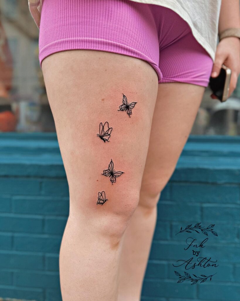 Delicate whimsy small butterfly tattoo ideas on thigh for women