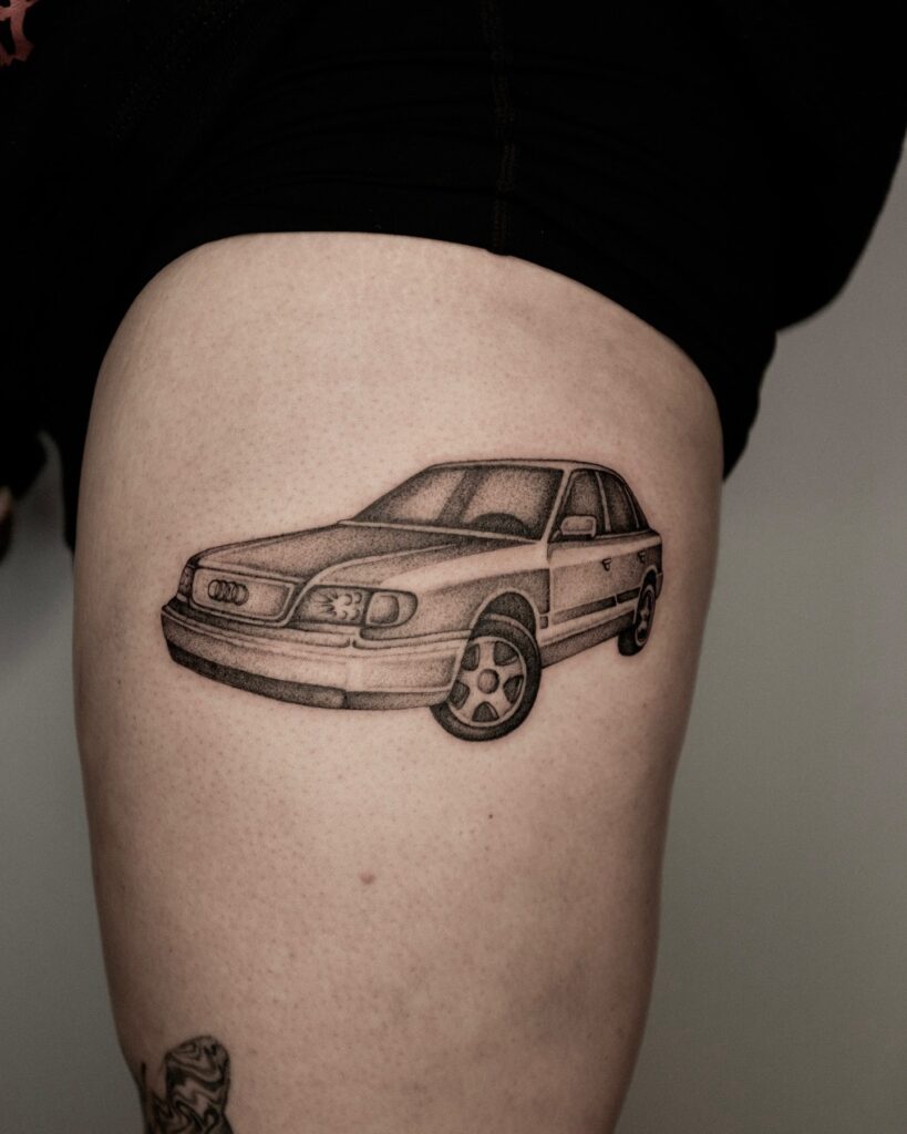 Detailed Audi Sedan Tattoo with Stippling Effect on Upper Thigh – Car Tattoo Ideas