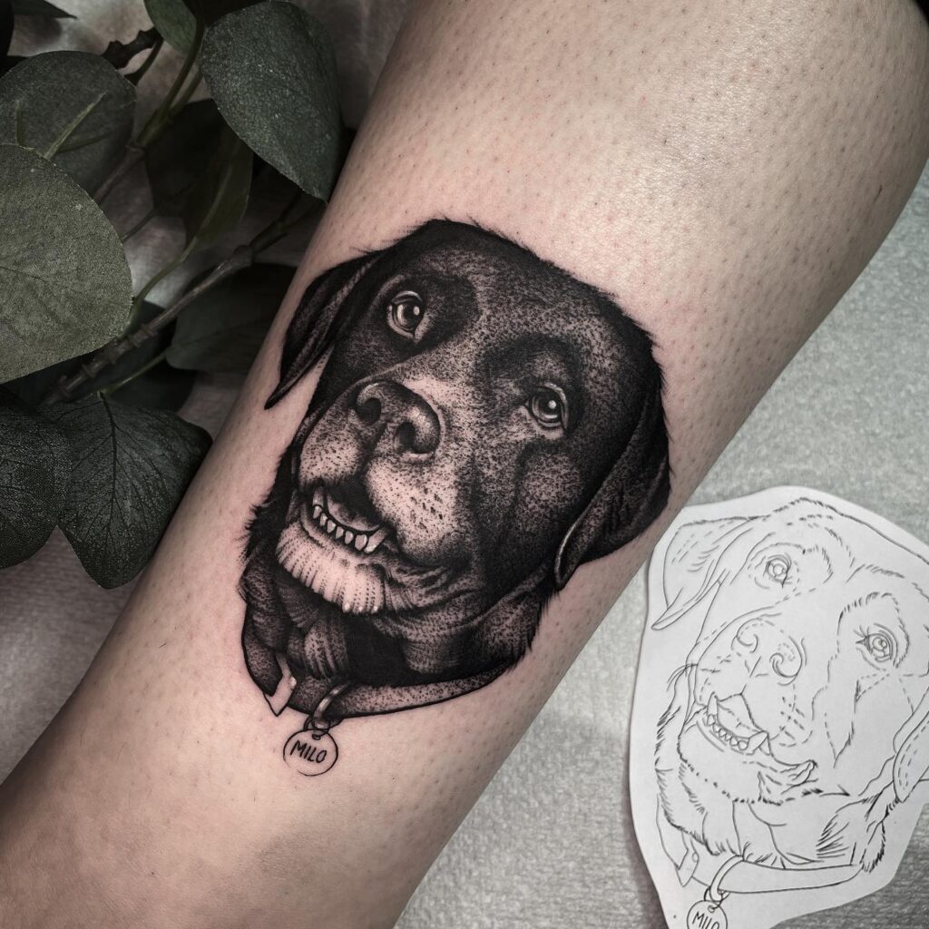 Detailed blackwork labrador retriever face portrait on the lower leg labrador legacy