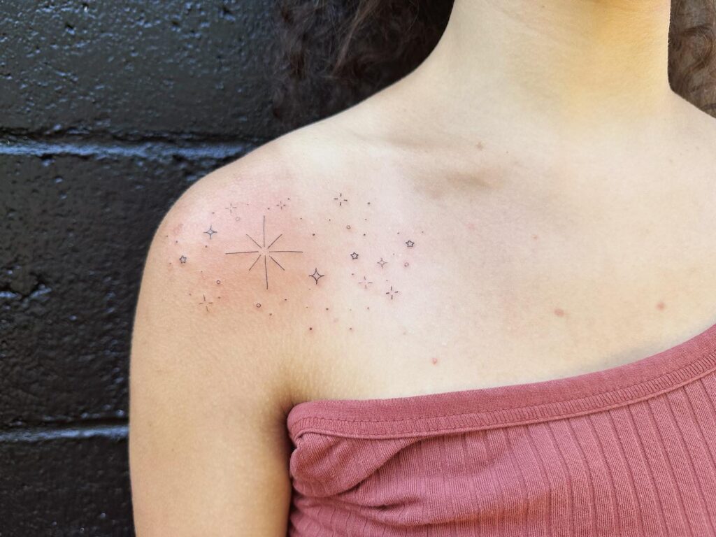 Detailed line work stars tattoo trends for shoulders