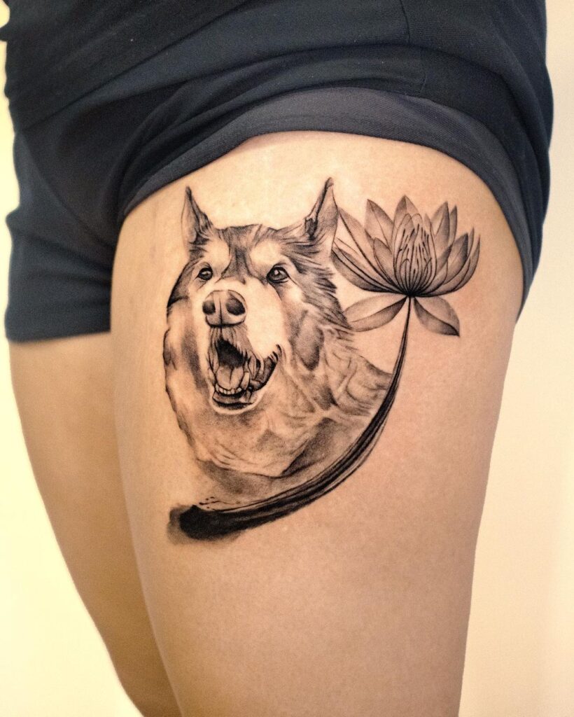 Dog face with lotus flower tattoo on the thigh husky elegance - dog tattoo ideas