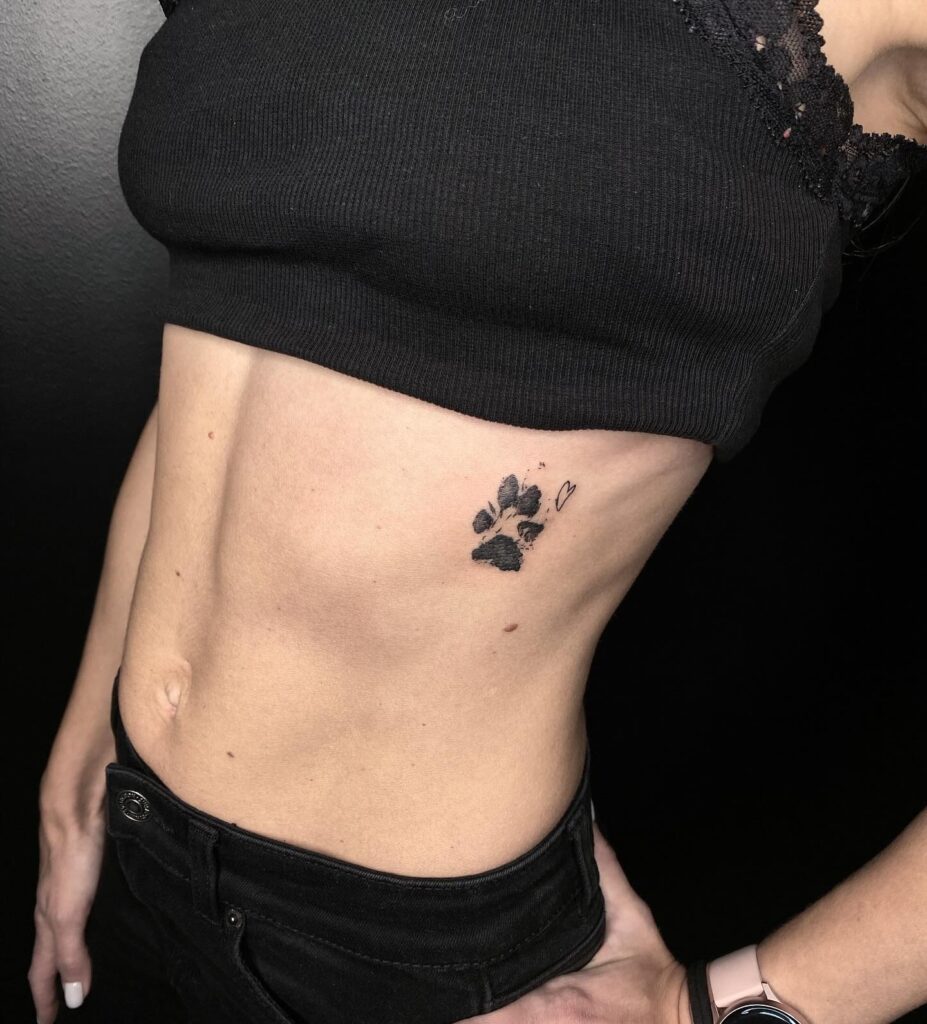 Dog Paw and Heart Line Tattoo on the Rib as a Memorial: Pawful of Love