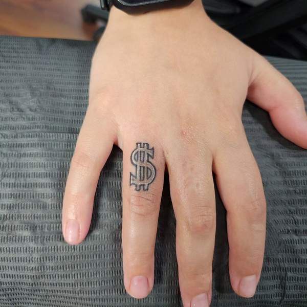 Dollar Sign Finger Tattoo 1