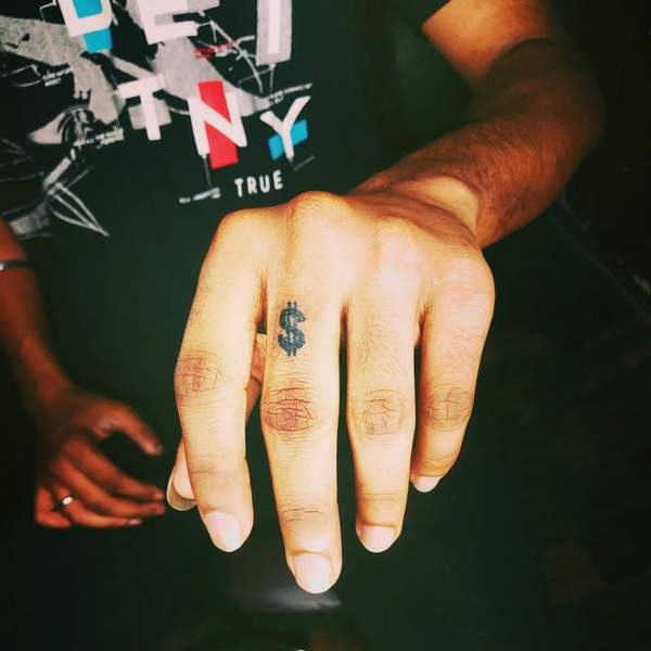 Dollar Sign Finger Tattoo 2