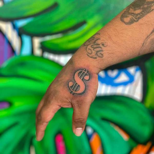 Dollar Sign Hand Tattoo 2