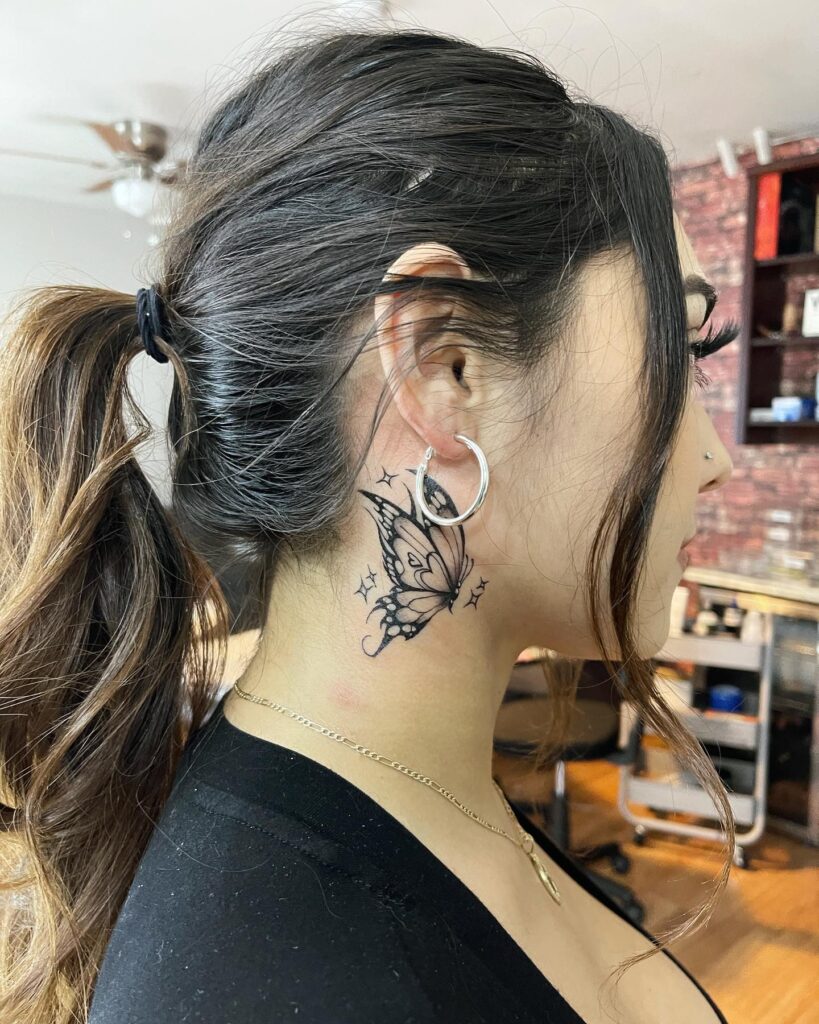 Dopest single butterfly simple elegance behind the female ear