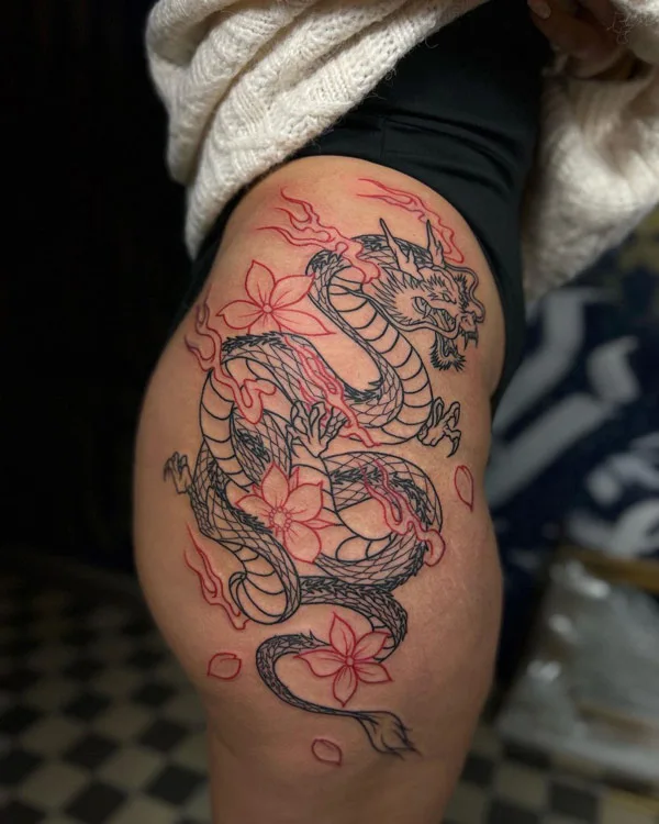 Dragon tattoo on thigh 10