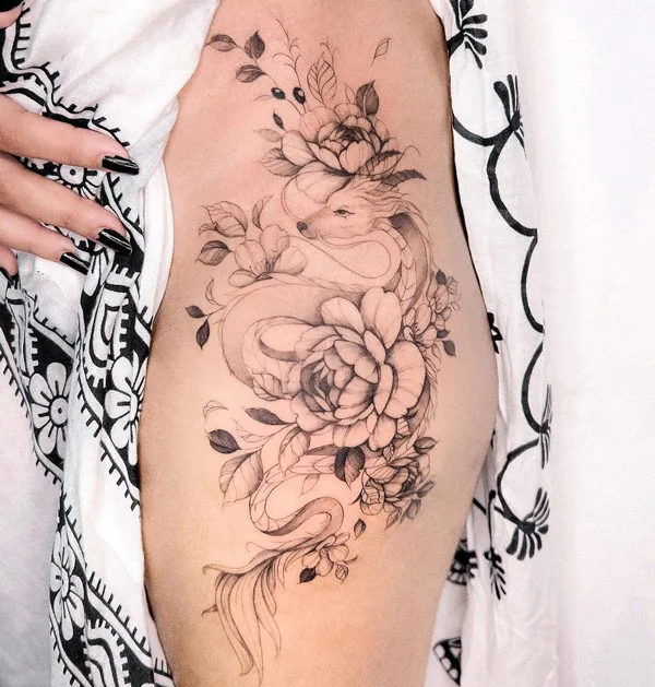 Dragon tattoo on thigh 19