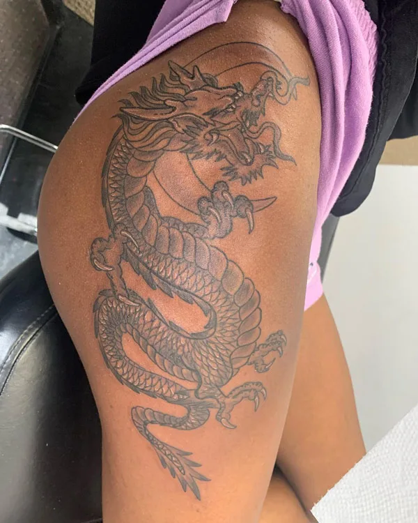 Dragon tattoo on thigh 26