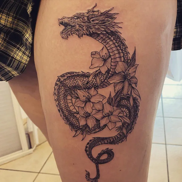 Dragon tattoo on thigh 29