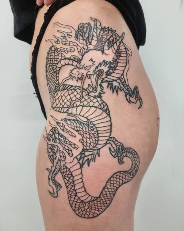Dragon tattoo on thigh 30