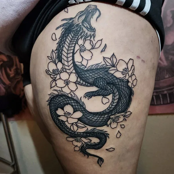 Dragon tattoo on thigh 31