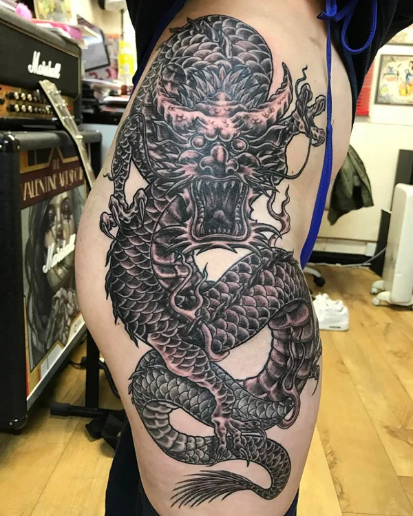 Dragon tattoo on thigh 40