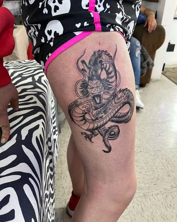 Dragon tattoo on thigh 42