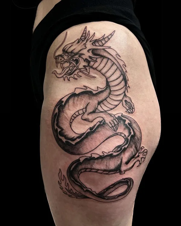 Dragon tattoo on thigh 50