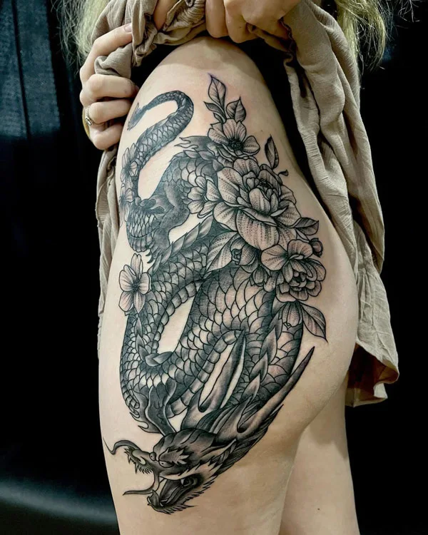 Dragon tattoo on thigh 51