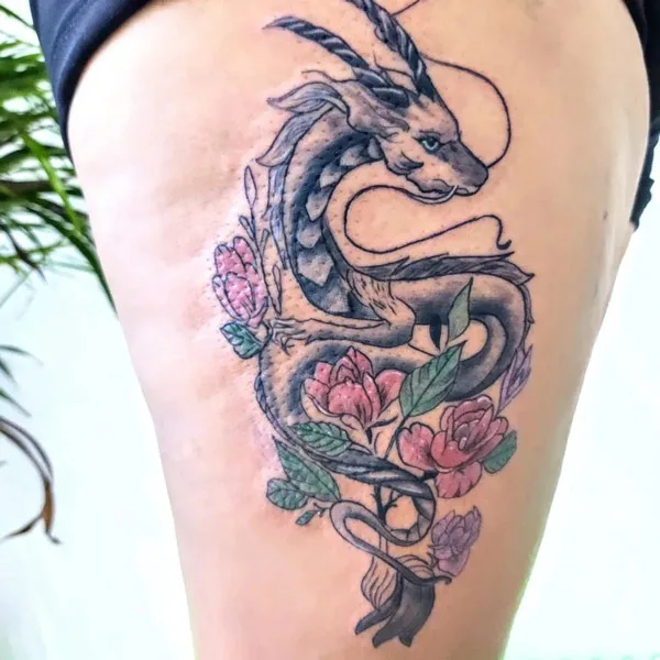 Dragon tattoo on thigh 57
