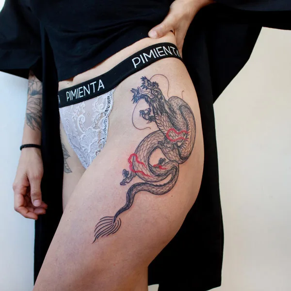 Dragon tattoo on thigh 6