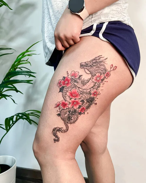 Dragon tattoo on thigh 7