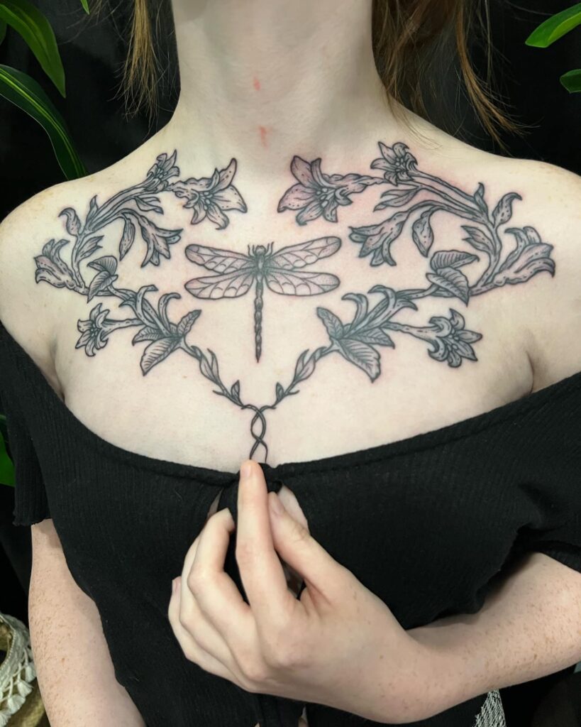 Dragonfly and Floral Chest Tattoo Symmetrical and Artistic Design