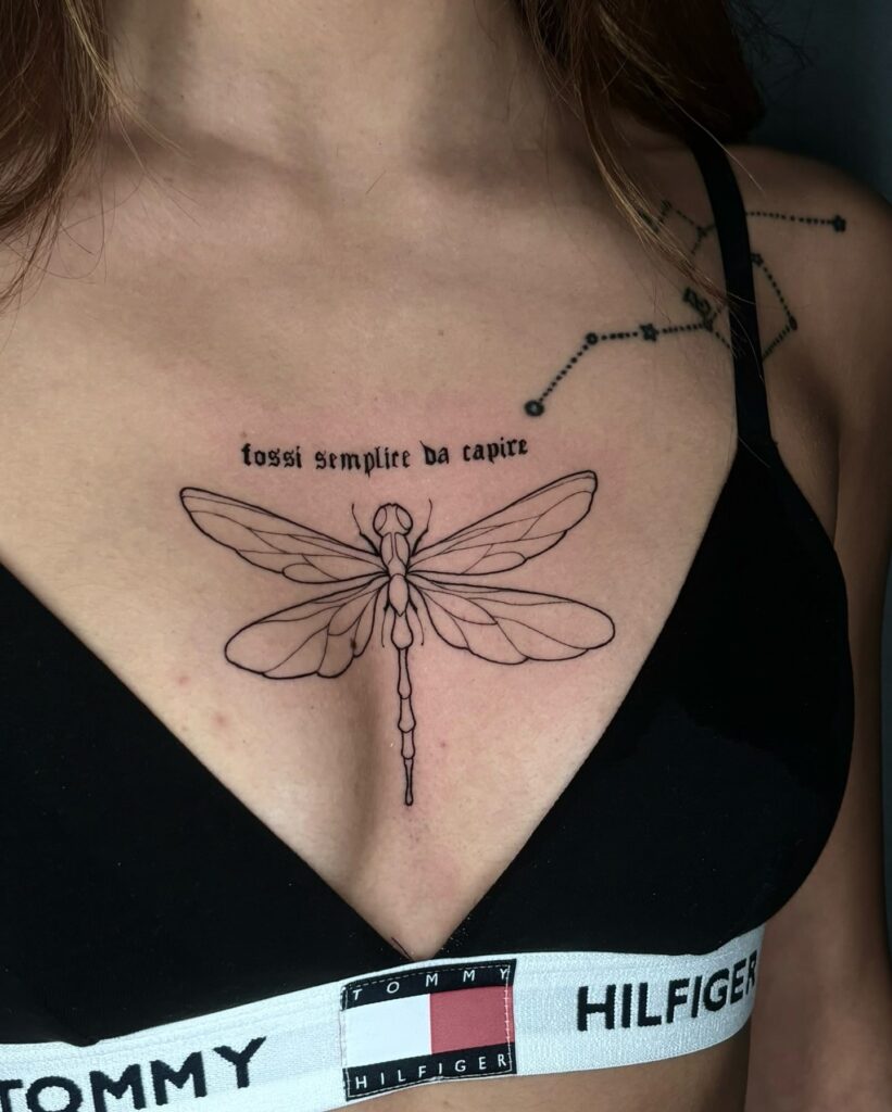Dragonfly Chest Tattoo with Italian Phrase and Constellation Design