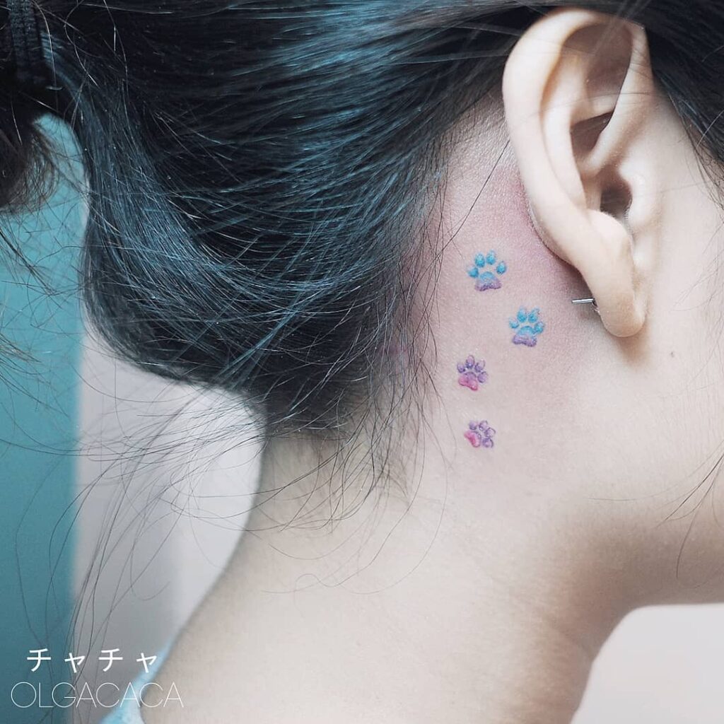 Earful of adoration watercolor paw prints behind the ear