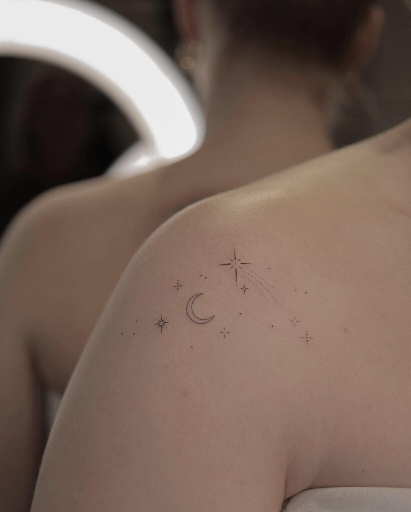 Elegant shoulder ink fineline shooting star tattoo for women