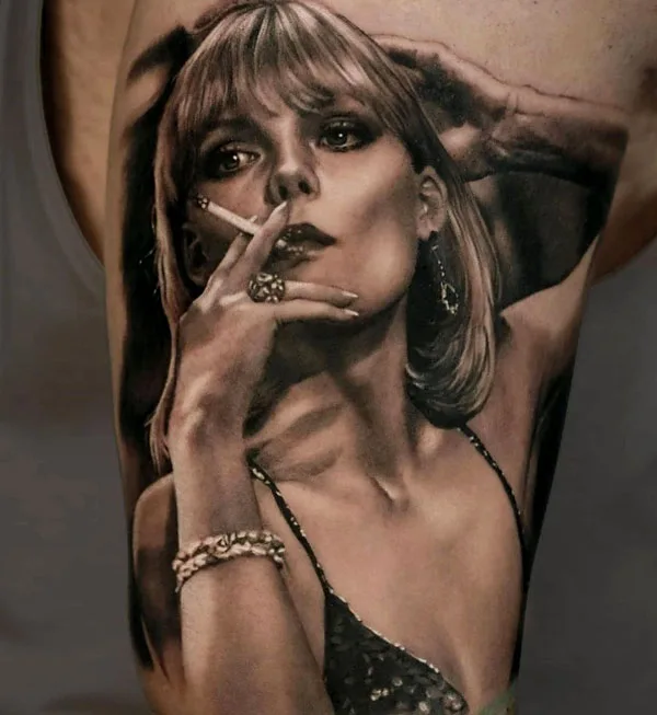 Elvira scarface tattoo