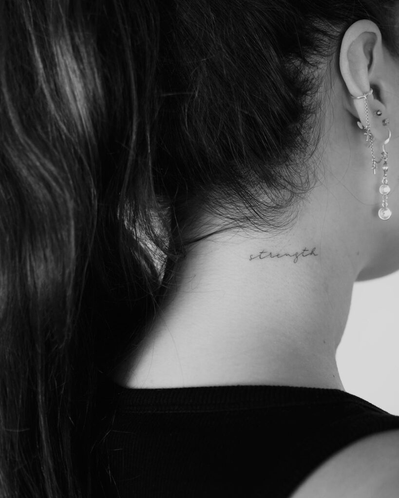 Empowerment in ink fine line strength tattoos on the side of the neck