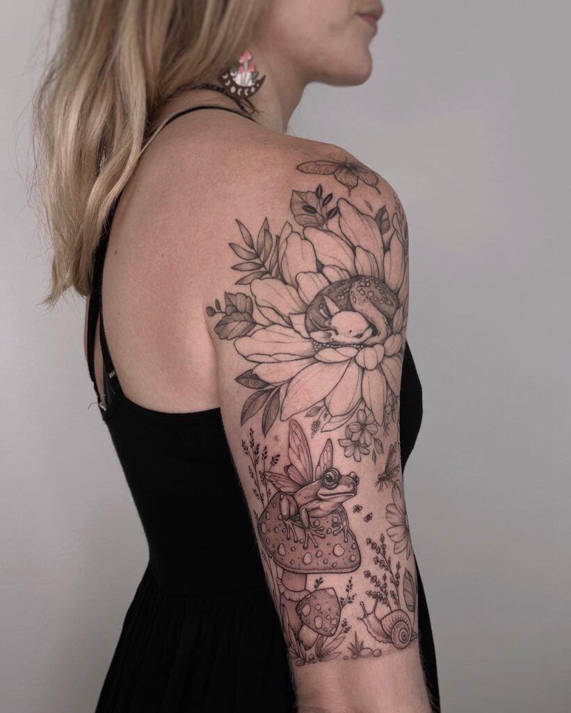 Enchanted Forest: A Nature-Inspired Half Sleeve Tattoo with Deer, Fawn, Frog, Fairy, and Mushroom Elements