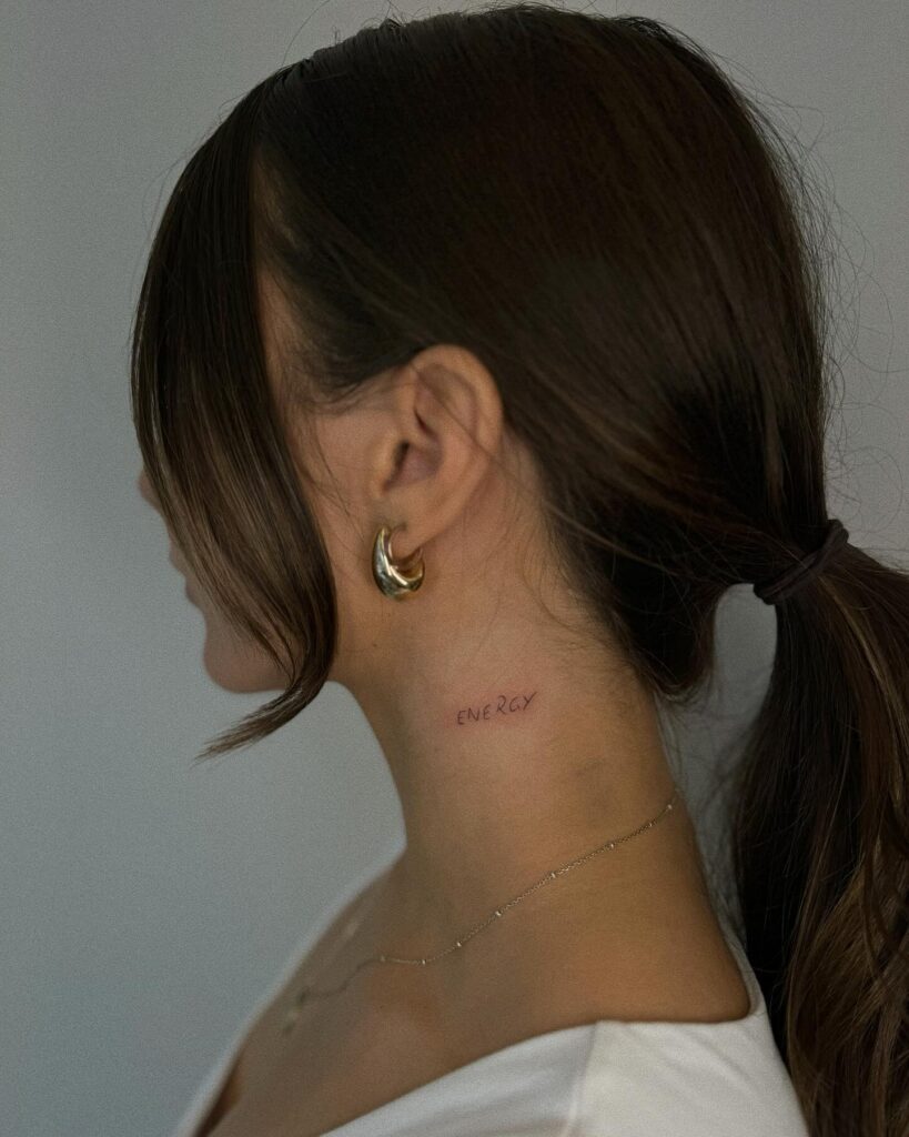 Energy Fine Lettering Tattoo on Neck Subtle Yet Bold Expression
