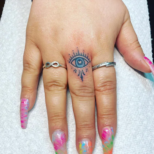 Evil Eye Finger Tattoo 1