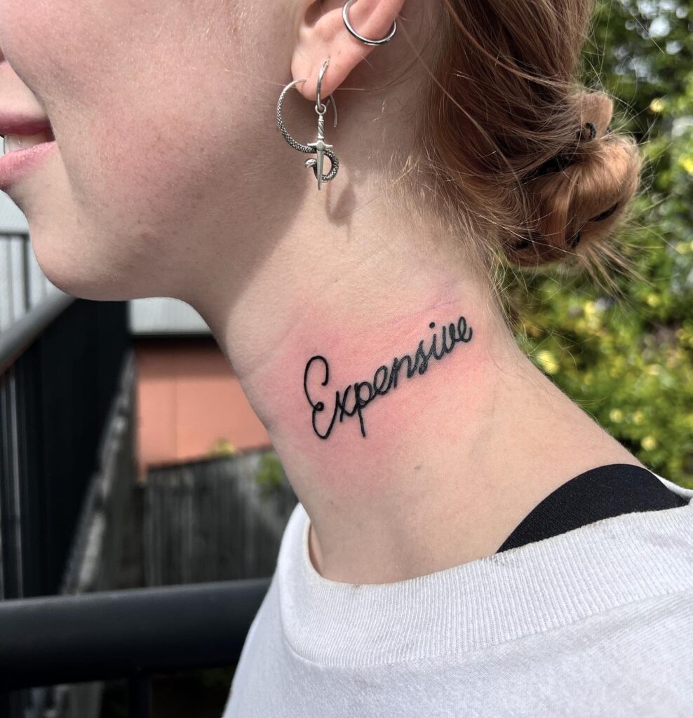 'Expensive' Bold Text Lettering on the Side of the Neck: Luxe Vibes