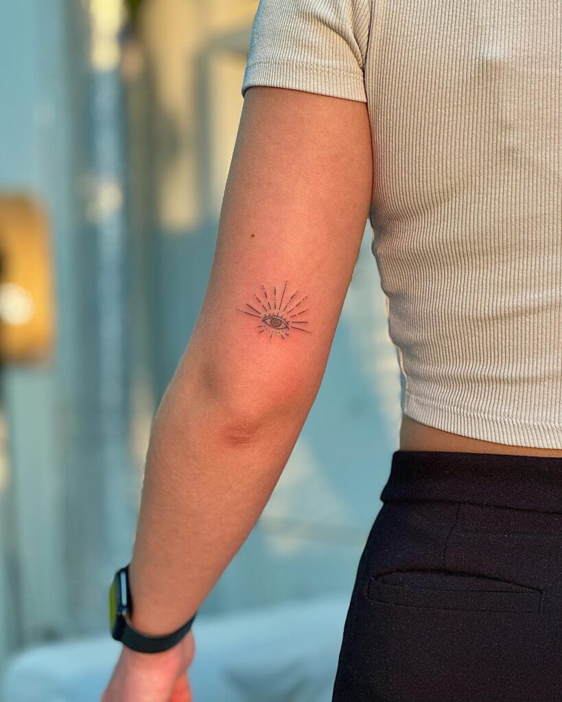 Eye Tattoo on the Back of the Above the Elbow: Gaze of Insight