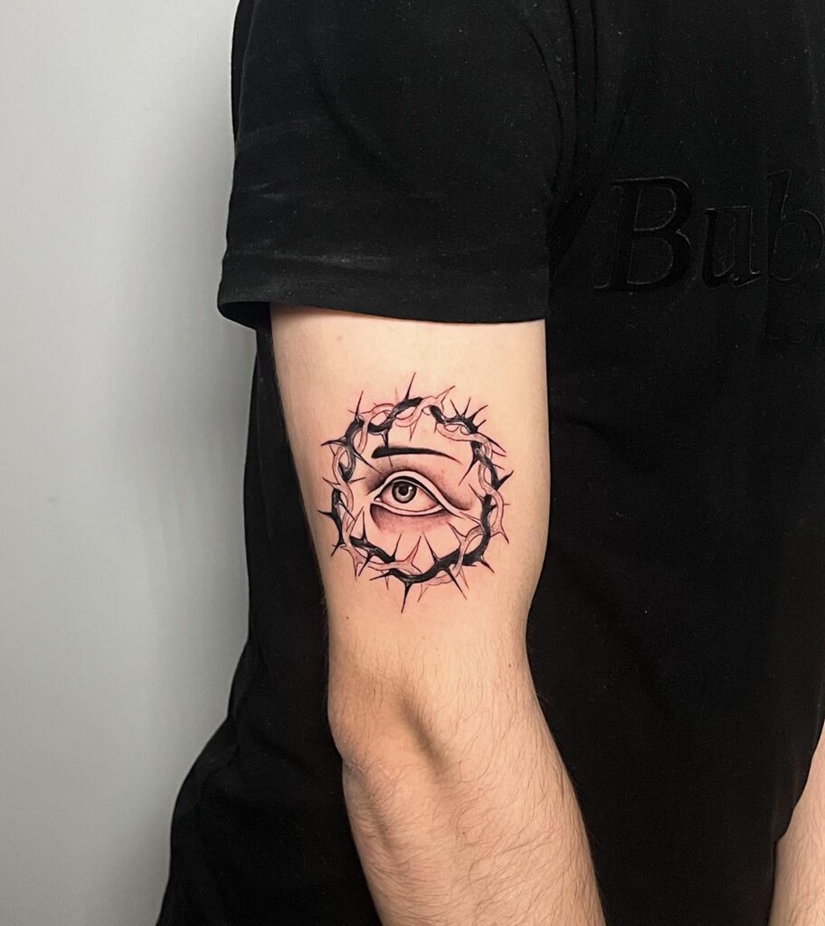 Eyeball Tattoo On Hand Surround With Thorns