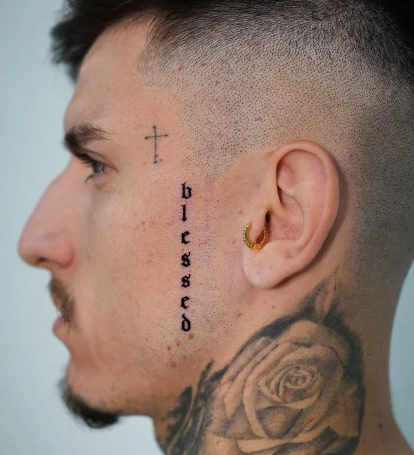Face Cross Tattoo 2