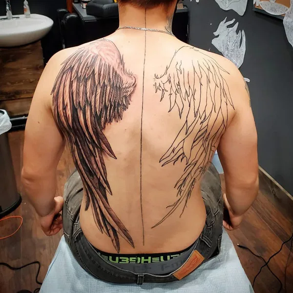 Fallen angel wings tattoo