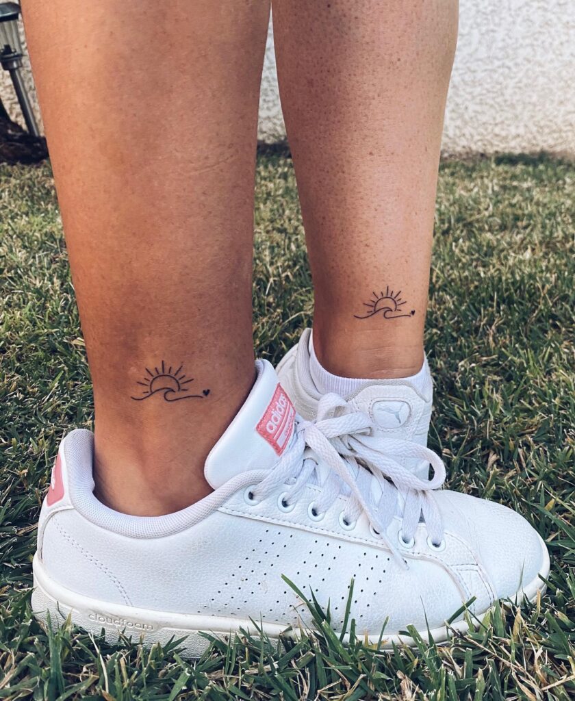 Family Bonding Ink: Matching Sun and Wave Tattoos for Mother and Daughter
