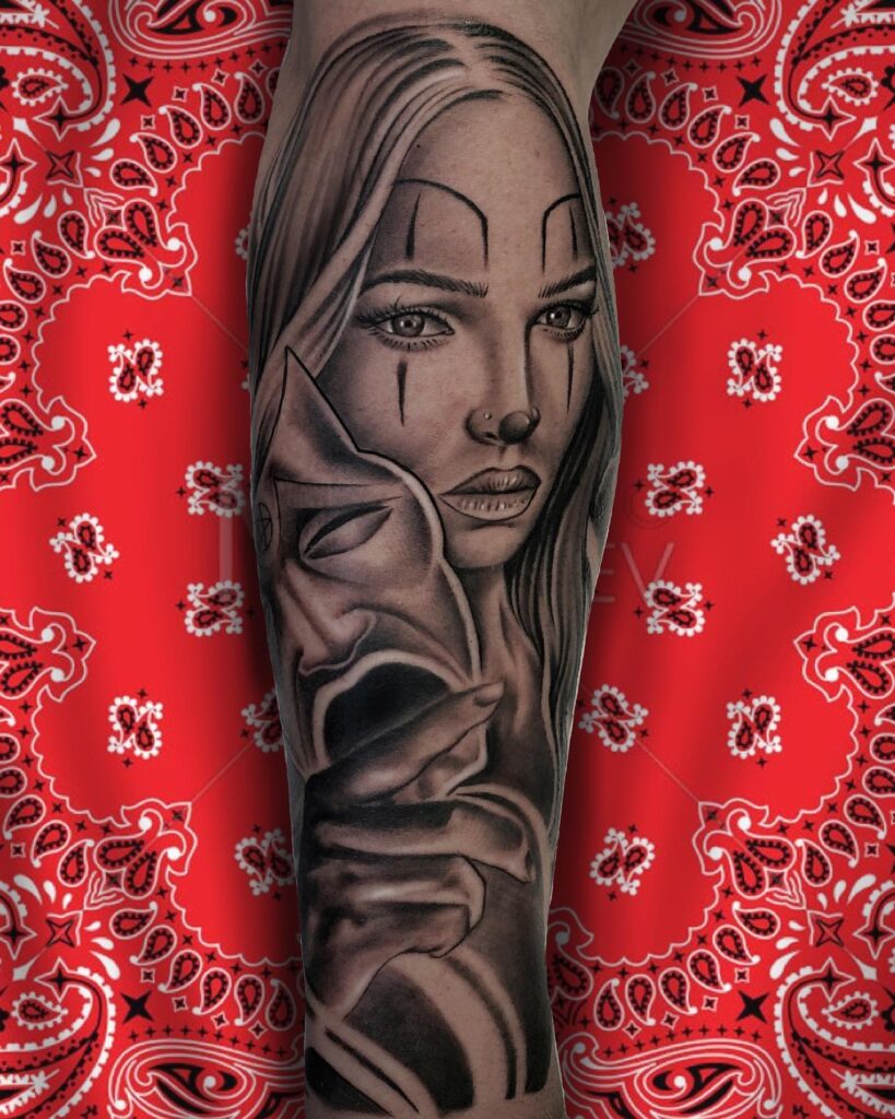 Feminine elegance laugh now cry later with girl face sleeve calf tattoo 
