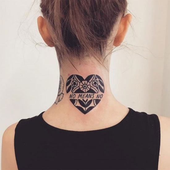 Feminist heart tattoo on neck