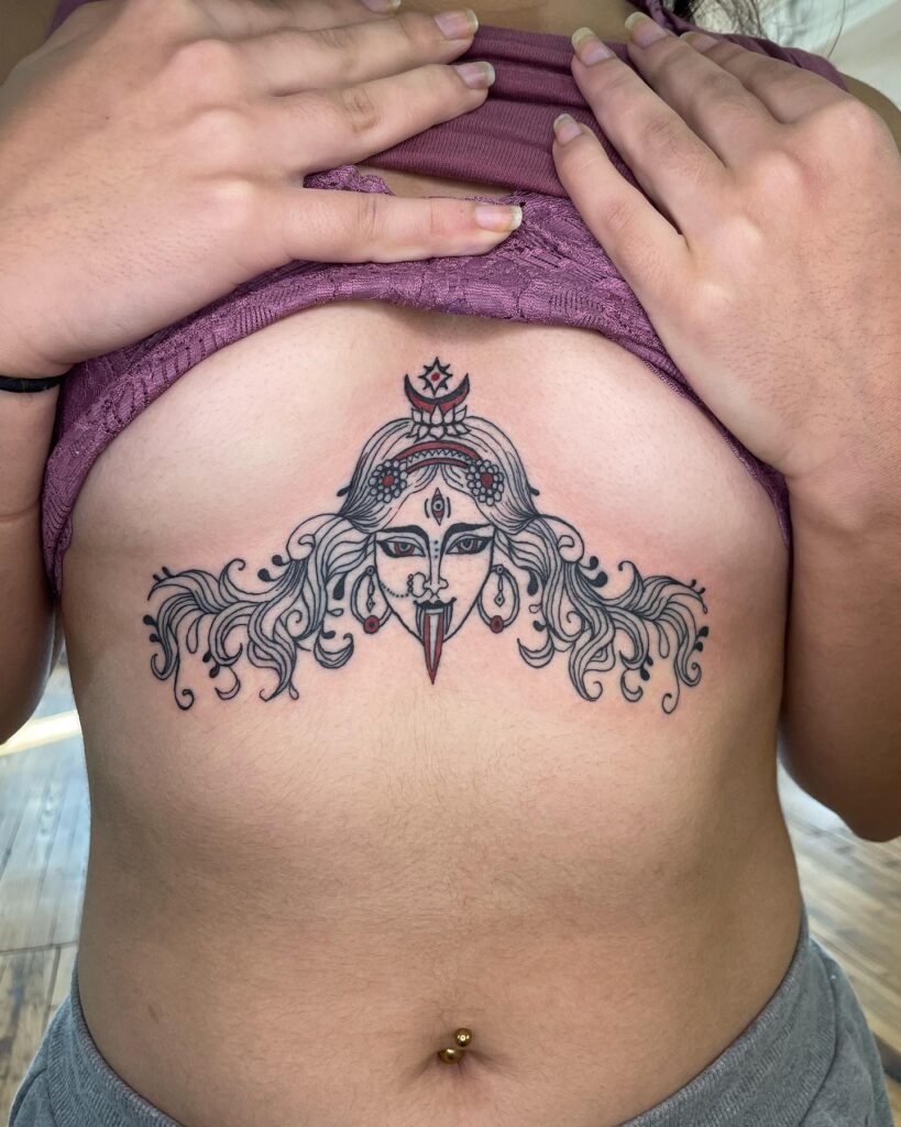 Fierce Goddess Kali tattoo with intricate detailing and cultural symbolism