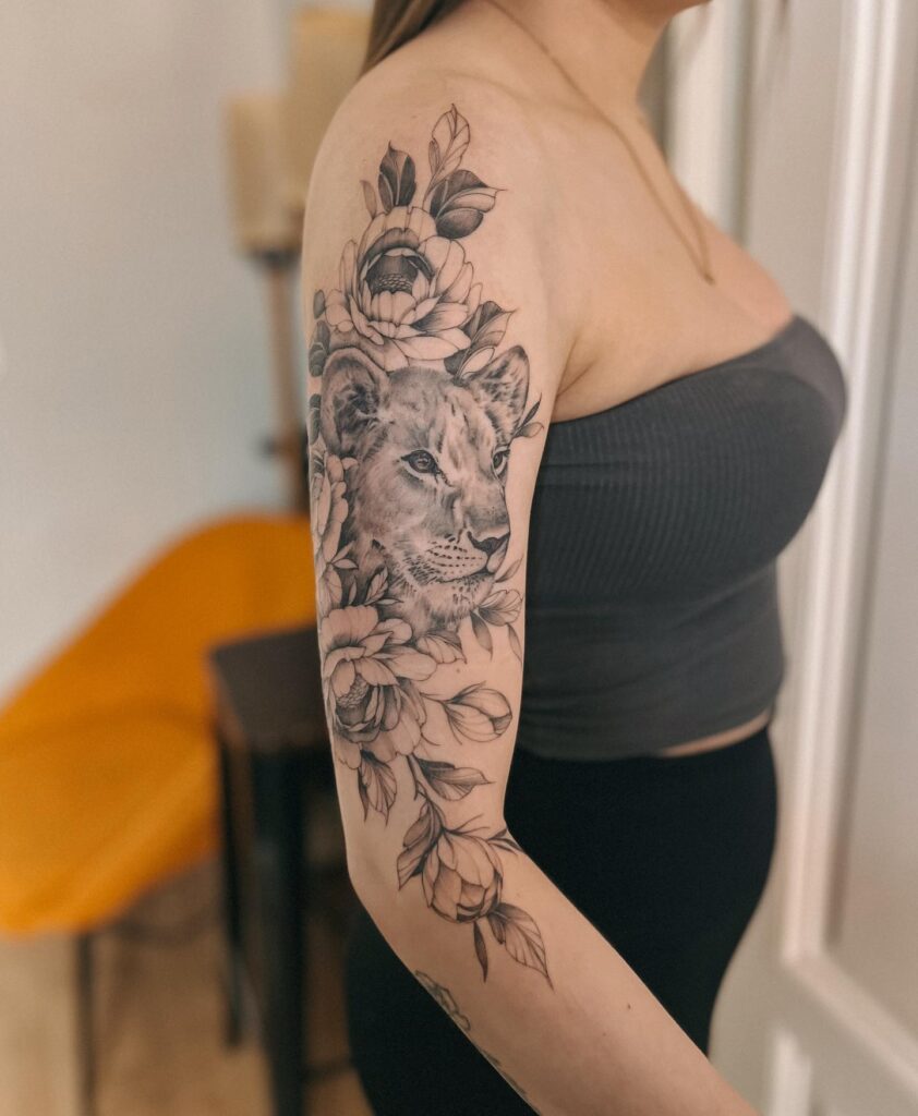 Fine Line Floral Lion Tattoo with Flowers for Women Half Sleeve Embracing Strength and Femininity