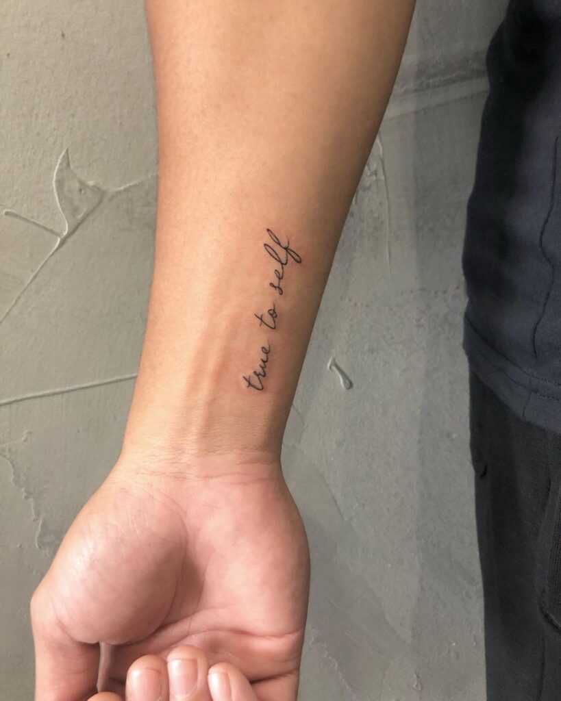 Fine line true to self script tattoo on inner wrist expressive ink