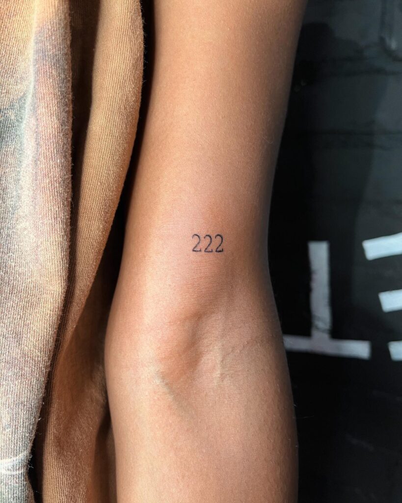 Fineline '222' Tattoo Above the Elbow for Girls, a Graceful Triplet: Ethereal Trio 