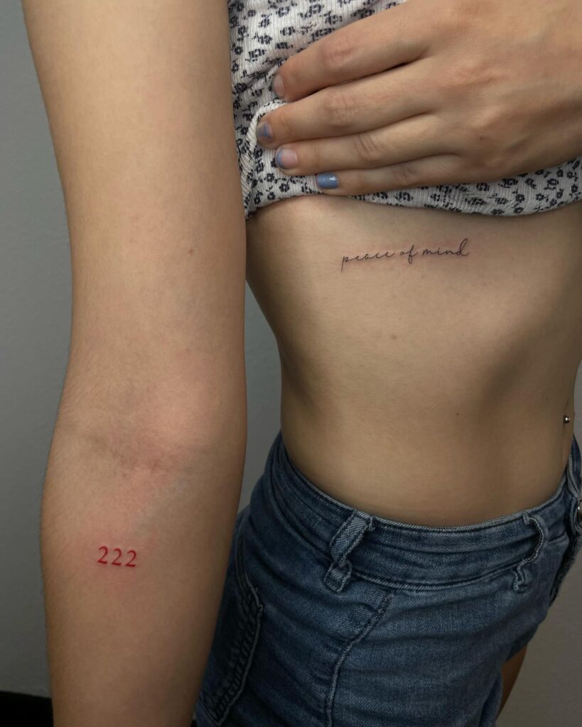 Fineline 222 Tattoo on the Forearm in Red, a Graceful Hue: Red Whispers 