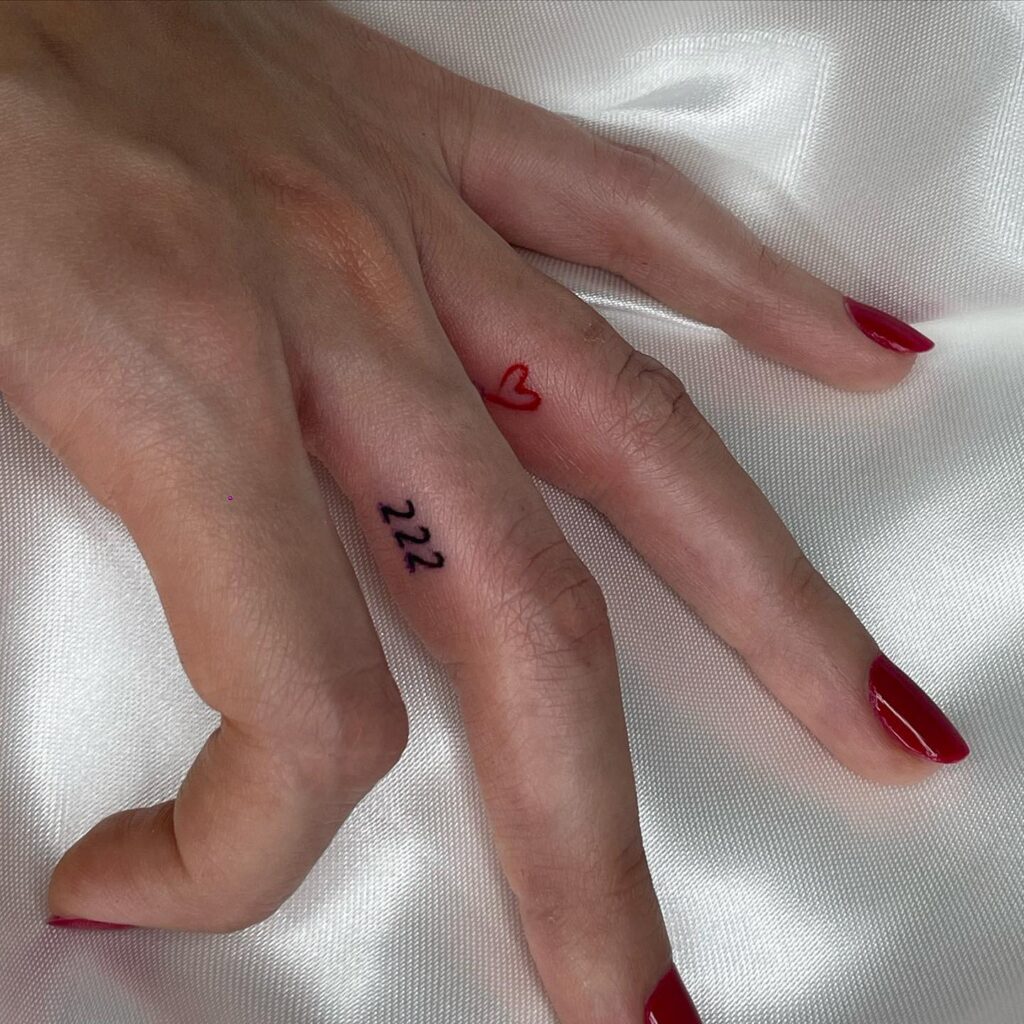 Fineline 222 Tattoo on the Side of the Middle Finger, a Delicate Mark: Digit Details 