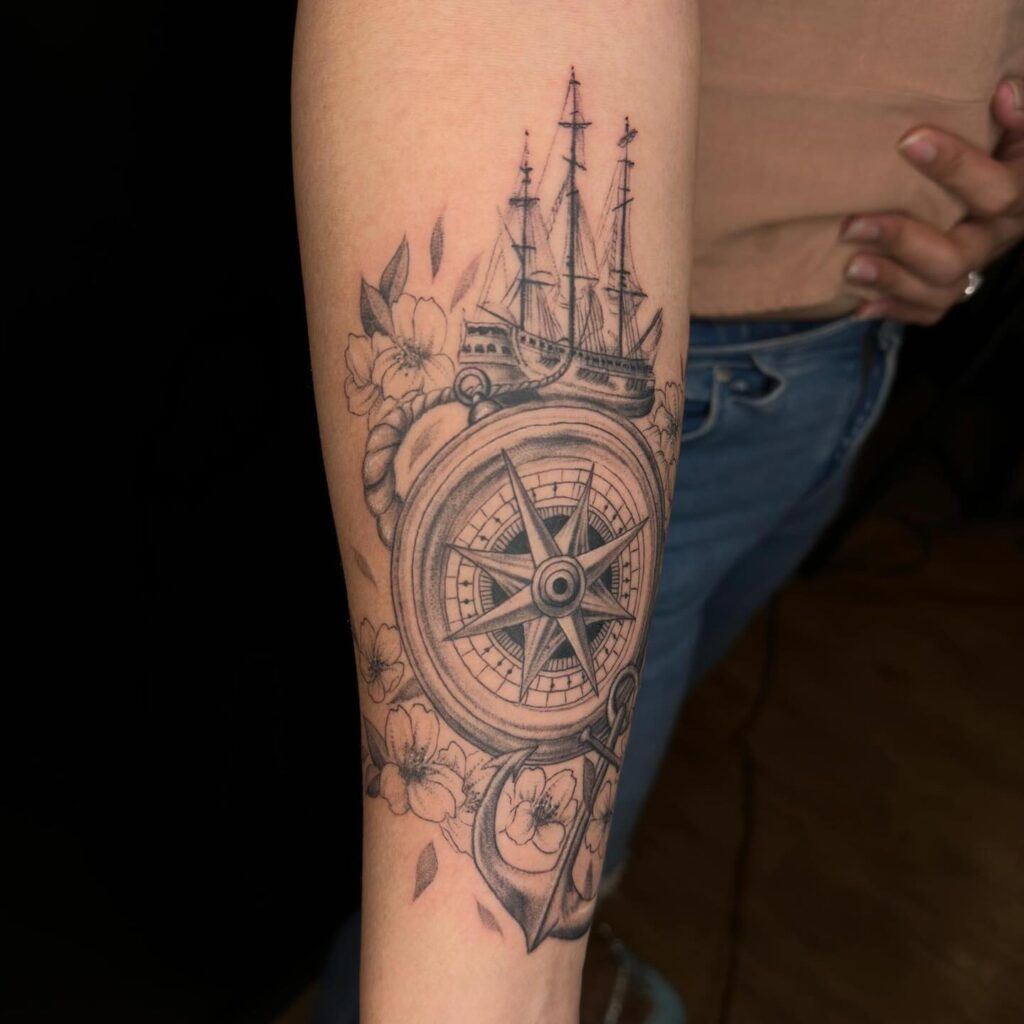 Fineline Anchor Ship Compass Tattoo with Flowers on the Forearm for a Harmonious Design: Maritime Symphony