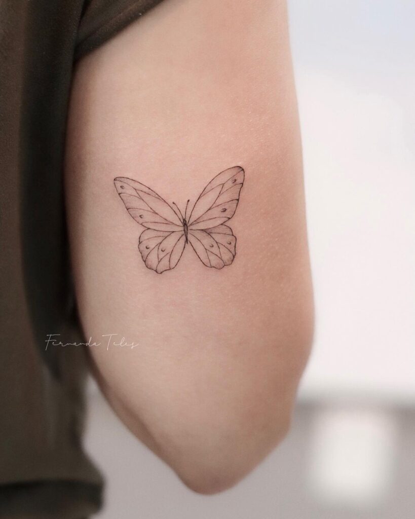 Fineline Butterfly Tattoo Above the Elbow: Butterfly Whimsy