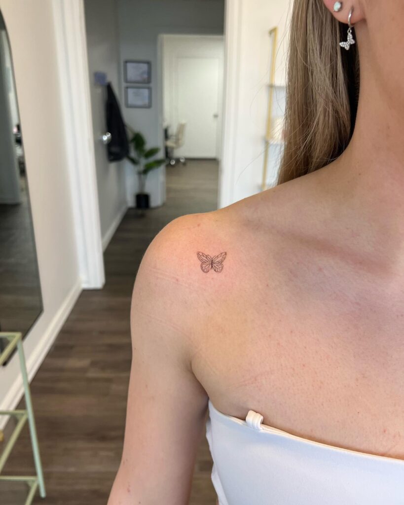 Fineline Butterfly Tattoo on the Arm and Shoulder: Graceful Flutter